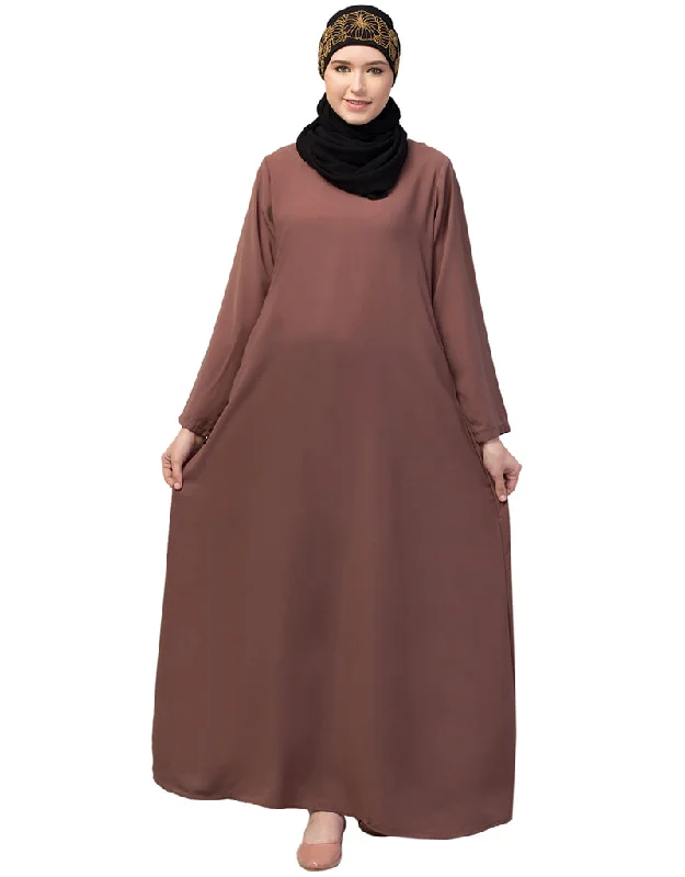 Trendy Abaya made from Nida fabric with a flared hem for a feminine touch In Color Light brown