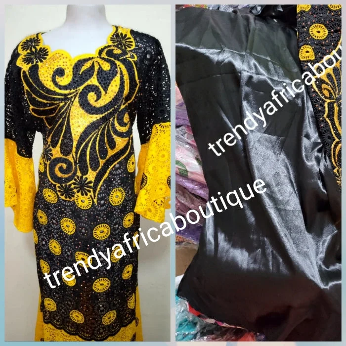 Sale: 3pcs set Yellow/black quantity swiss dry lace free flowing bubu. Senegalese bubu or gown, beautiful chest Embriodery/Swarovski stones embellishment. Fit Burst 46", gown  lenght 60" shoulder to floor, sleeve lenght 17" long gown+ inner + scarf