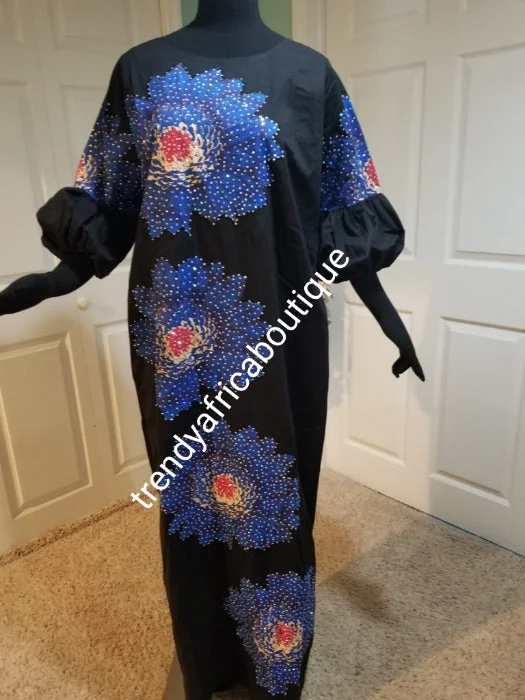 Latest Ankara-kaftan embellished  with shinning Swarovski stones to perfection! SIZE 16: Fit Burst 44" and full lenght 57" shoulder to floor. Sleeve 18". Latest design Ankara patch kaftan embriodered and stoned. Latest Ankara Kaftan dress